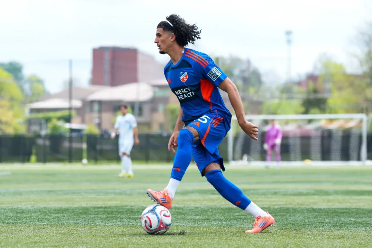 Player dribbling the ball during MLS Next Pro match Player dribbling the ball during MLS Next Pro match