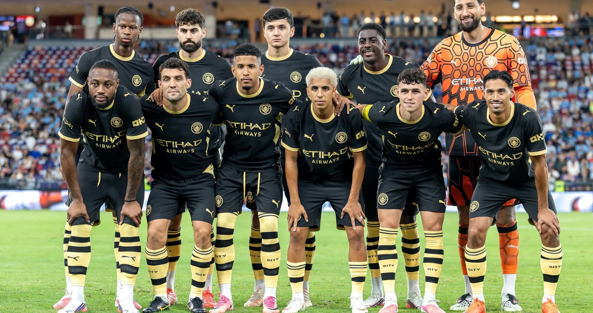 Football team posing for group photo before match Football team posing for group photo before match