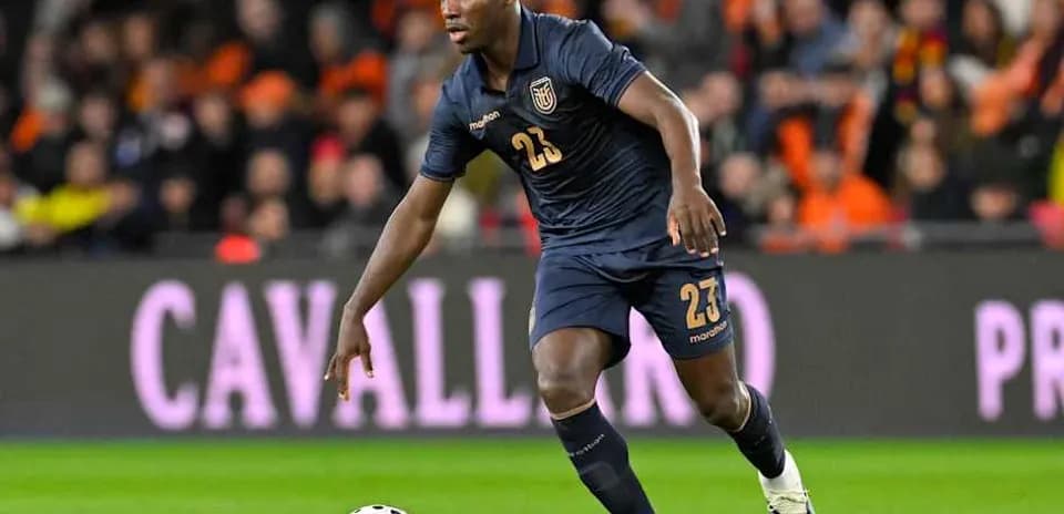 Player dribbling the ball during a match Player dribbling the ball during a match
