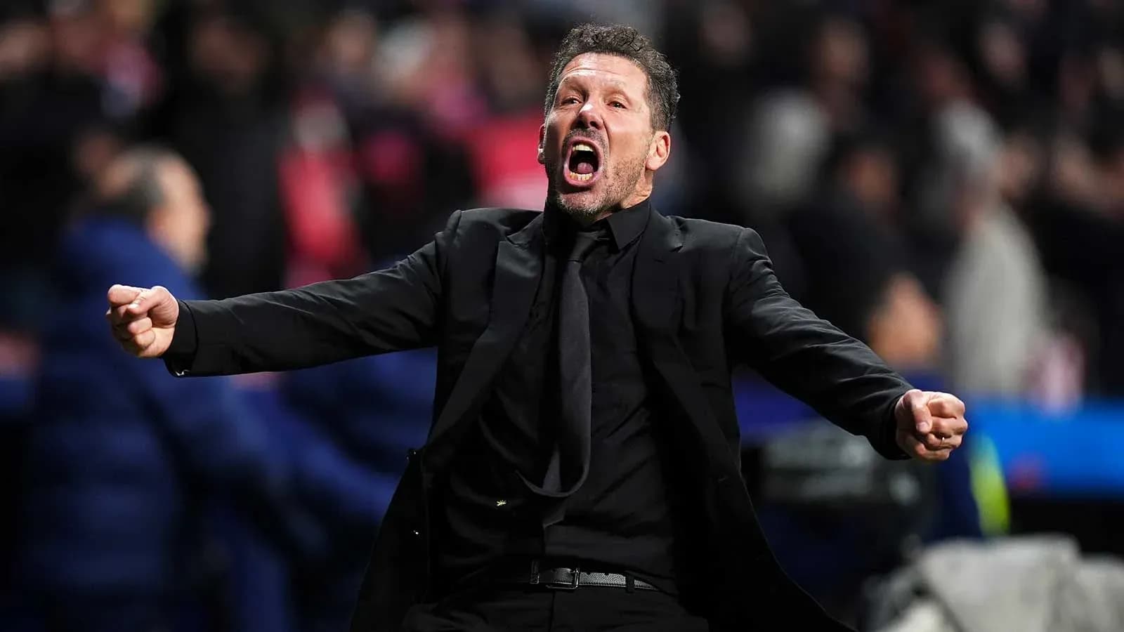 Coach celebrating passionately on the sidelines Coach celebrating passionately on the sidelines