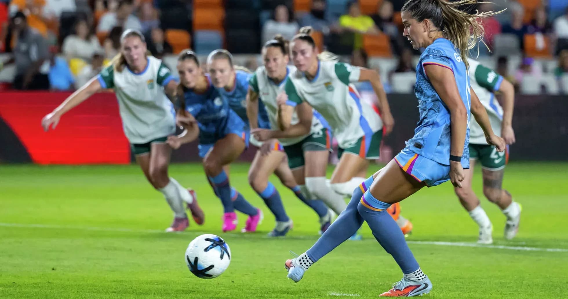 Player taking a penalty kick during match Player taking a penalty kick during match