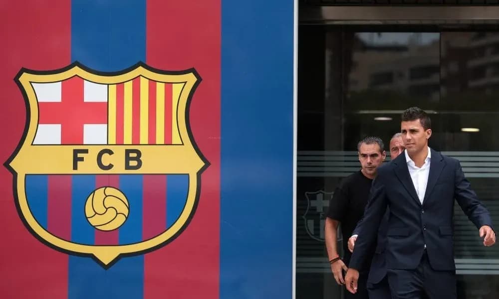 Player leaving FC Barcelona facility in formal attire Player leaving FC Barcelona facility in formal attire