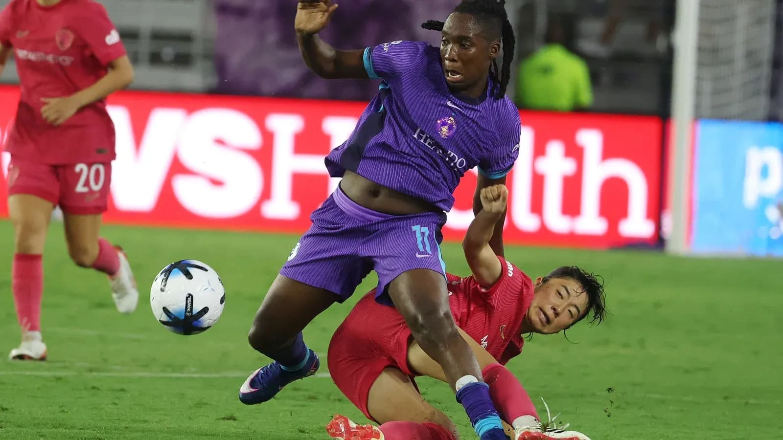 Orlando Pride player falling during match action Orlando Pride player falling during match action