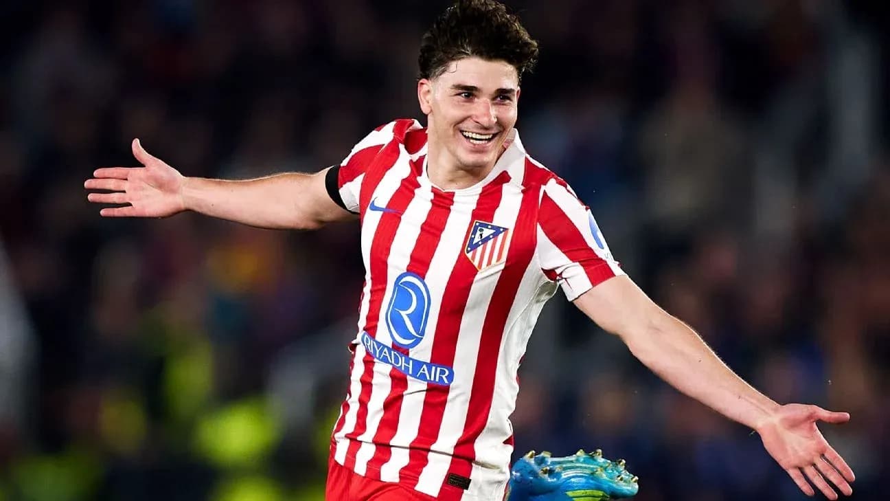 Player celebrating goal in Atlético Madrid jersey Player celebrating goal in Atlético Madrid jersey