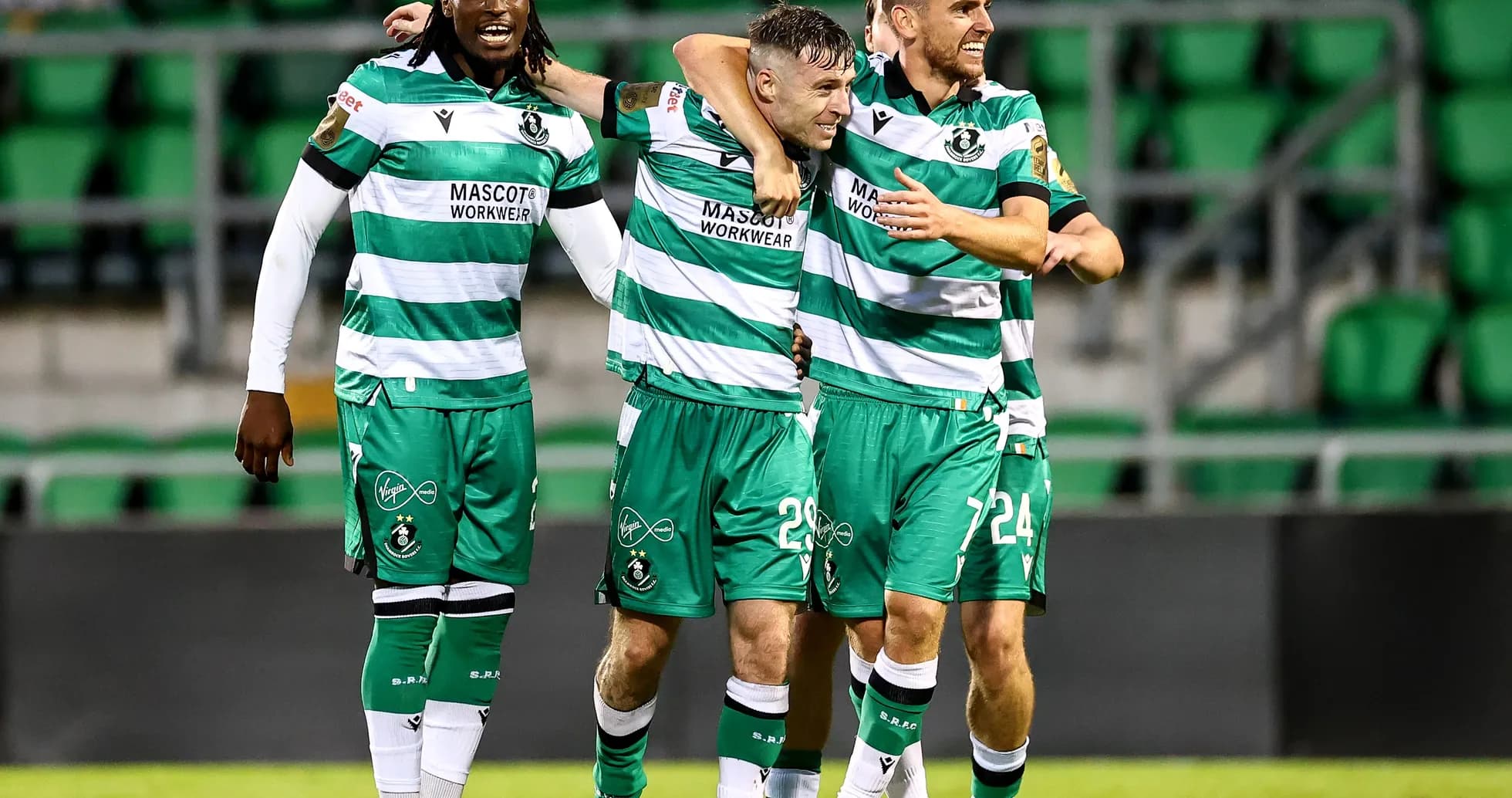 Shamrock Rovers players celebrating a goal Shamrock Rovers players celebrating a goal