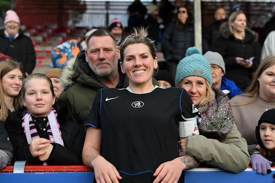 Player celebrating with fans at the stadium Player celebrating with fans at the stadium