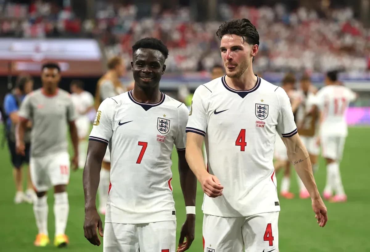 Two England players walking off the field after match Two England players walking off the field after match