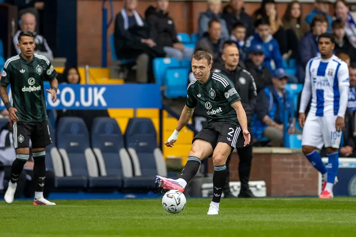 Player kicking ball during a football match Player kicking ball during a football match