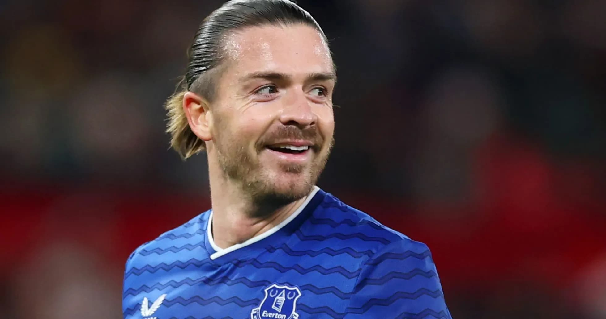 Player smiling while wearing Everton jersey Player smiling while wearing Everton jersey