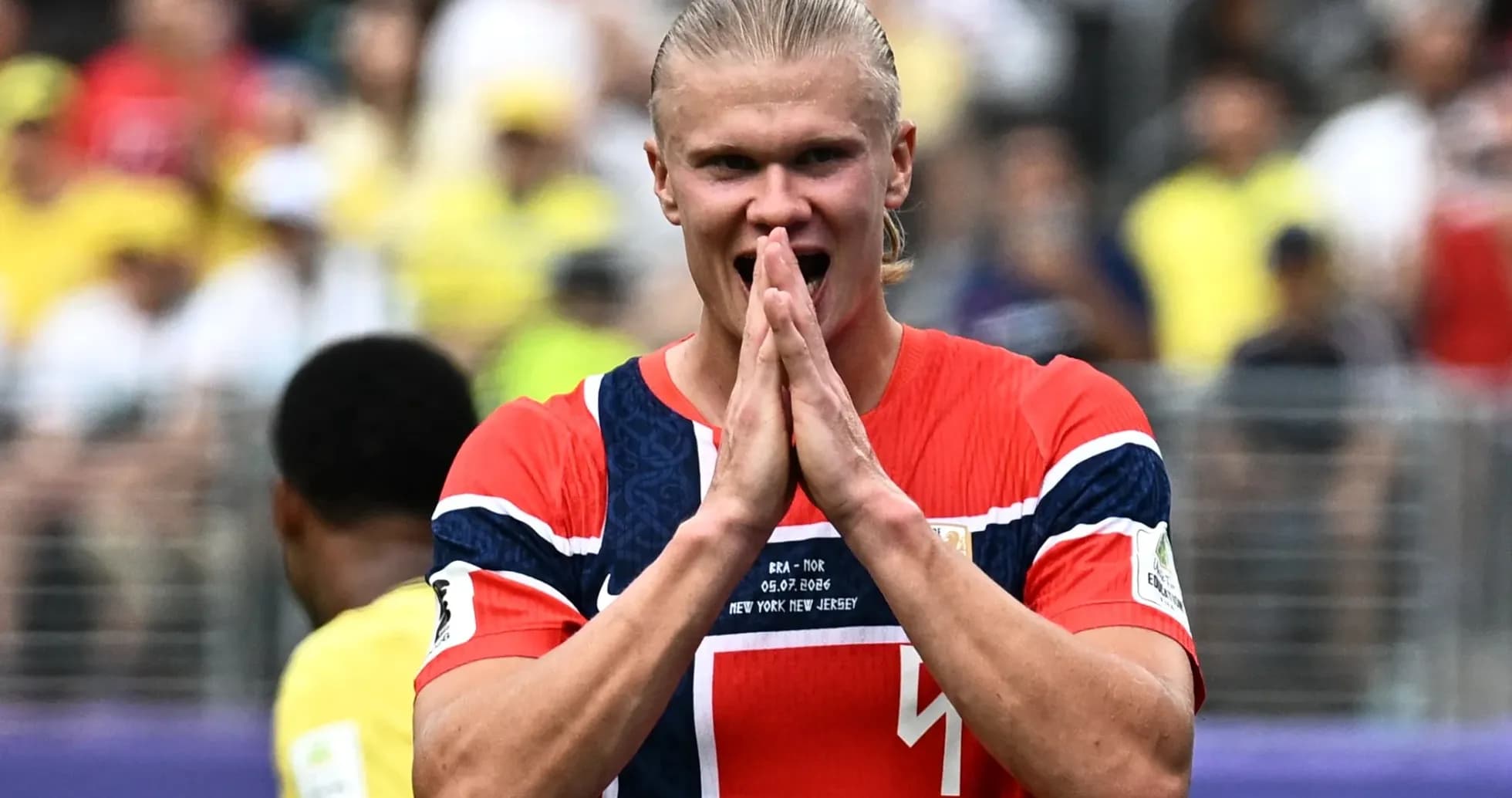 Player celebrating during match in stadium Player celebrating during match in stadium