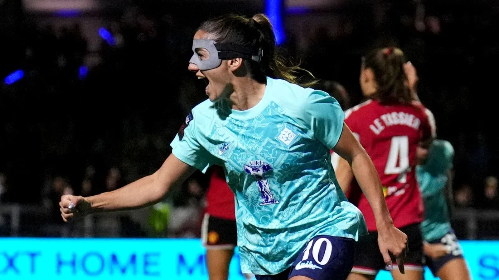 Player celebrating after scoring a goal in match Player celebrating after scoring a goal in match