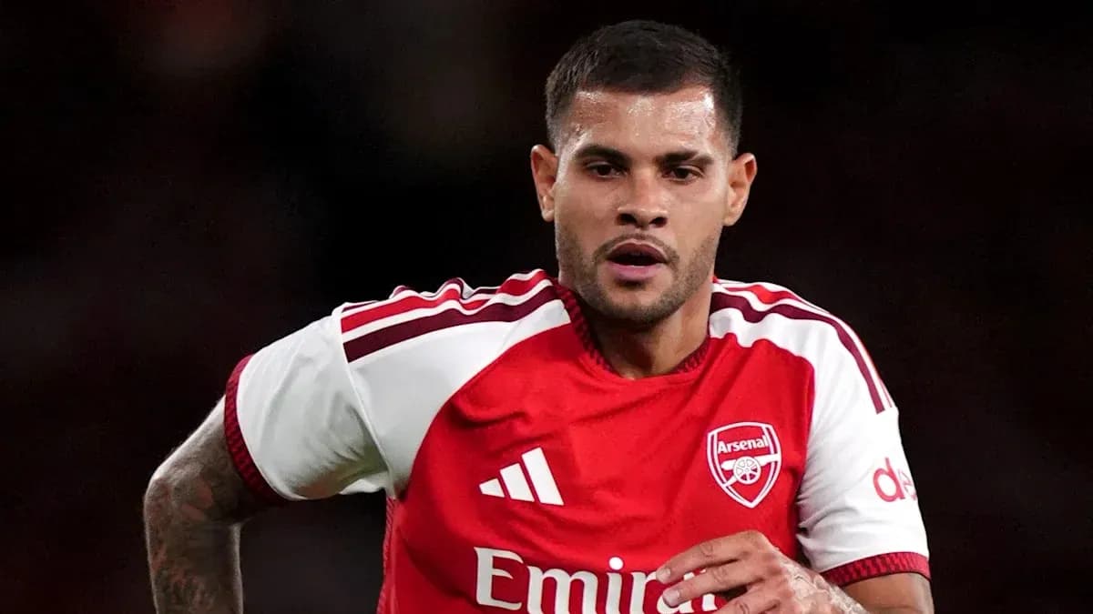 Player running in Arsenal kit during match Player running in Arsenal kit during match