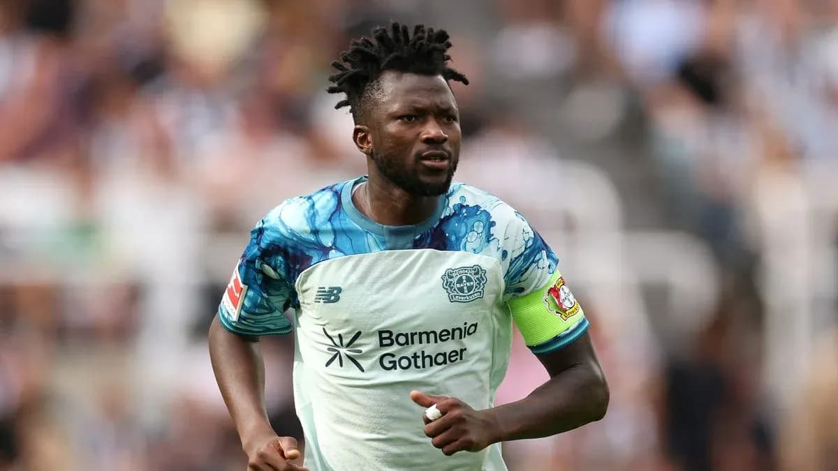 Player in action wearing Bayer Leverkusen jersey Player in action wearing Bayer Leverkusen jersey