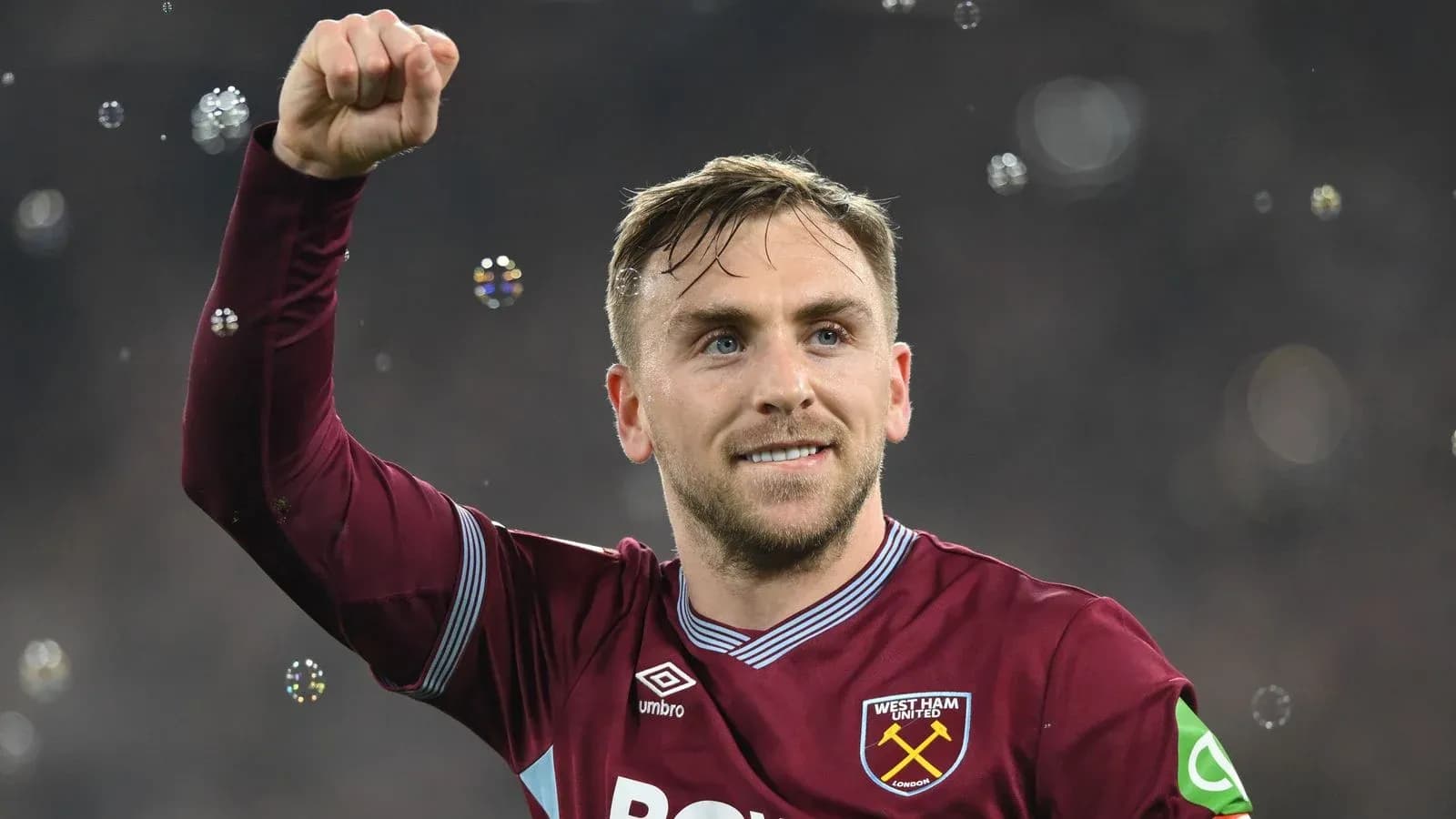 West Ham United player celebrating with raised fist West Ham United player celebrating with raised fist