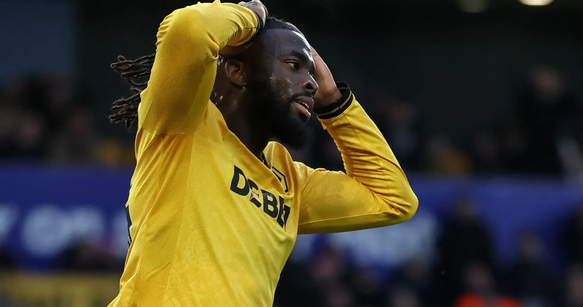 Player in yellow shirt reacting during match Player in yellow shirt reacting during match