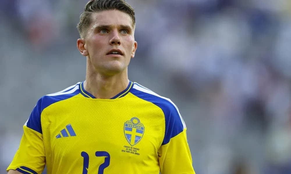 Player in yellow Sweden jersey on field Player in yellow Sweden jersey on field