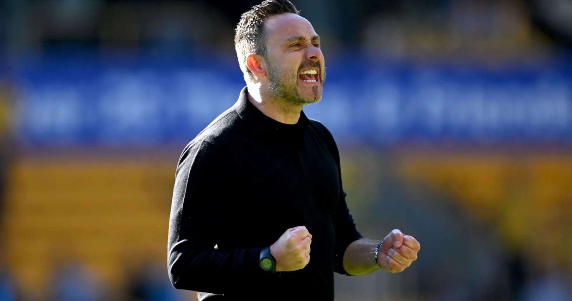 Coach celebrating passionately on the sideline Coach celebrating passionately on the sideline