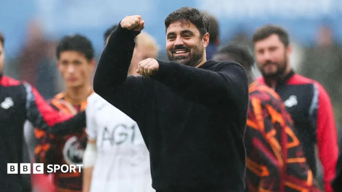 Coach celebrating with players during training session Coach celebrating with players during training session