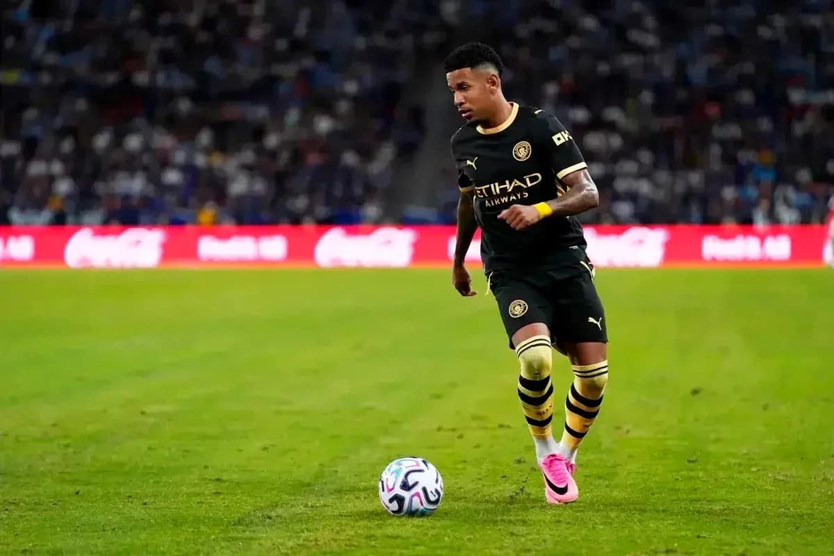 Player dribbling ball on the field during match Player dribbling ball on the field during match