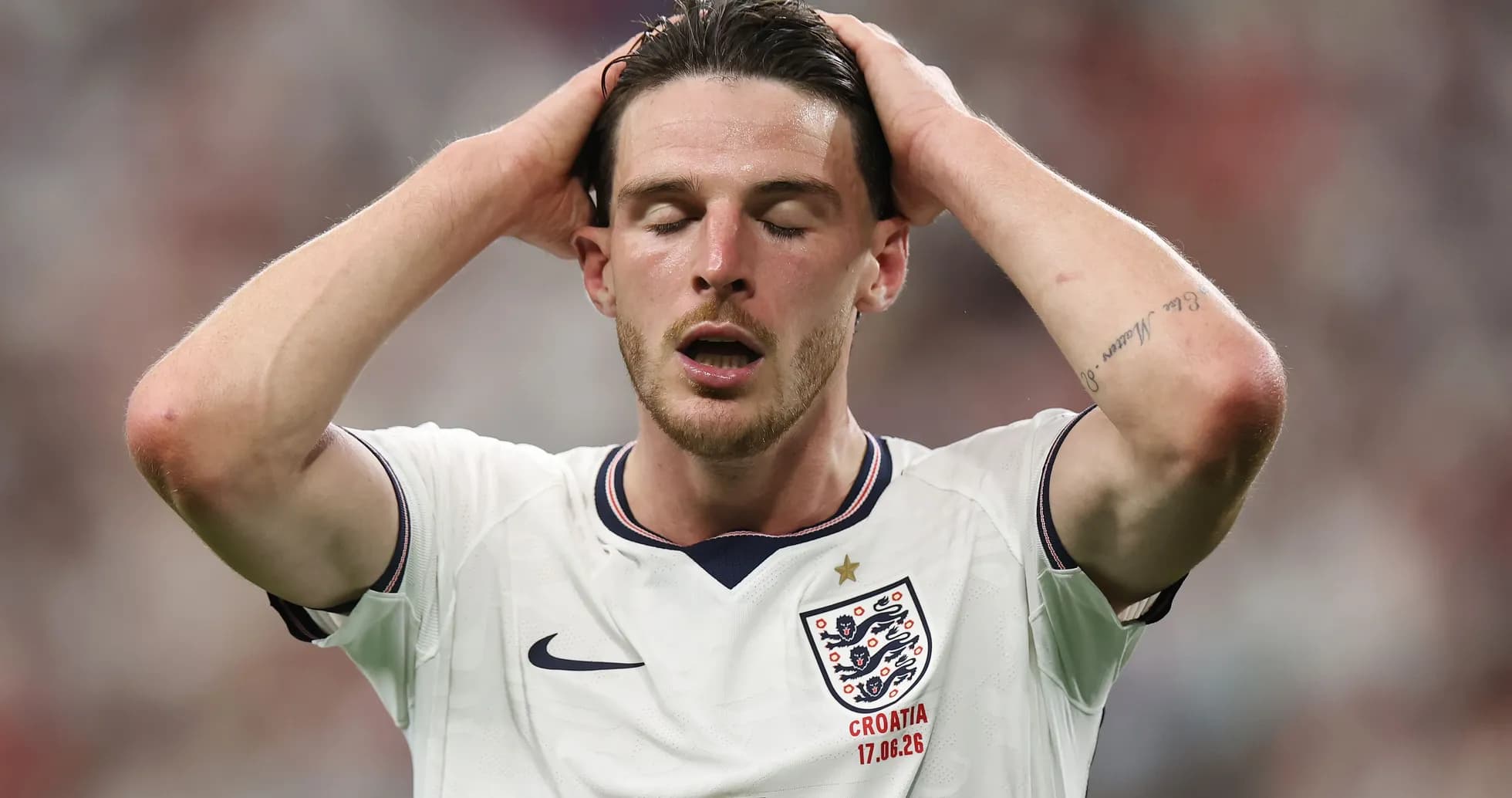 Player with hands on head during match Player with hands on head during match