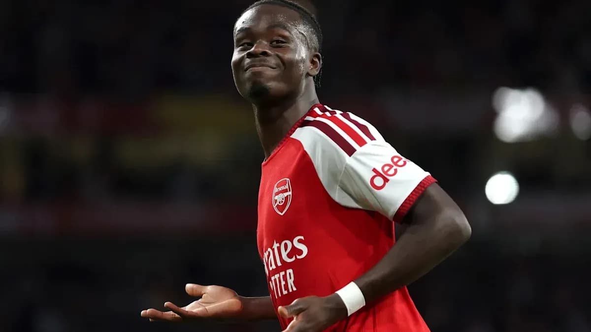 Player celebrating in Arsenal kit during match Player celebrating in Arsenal kit during match