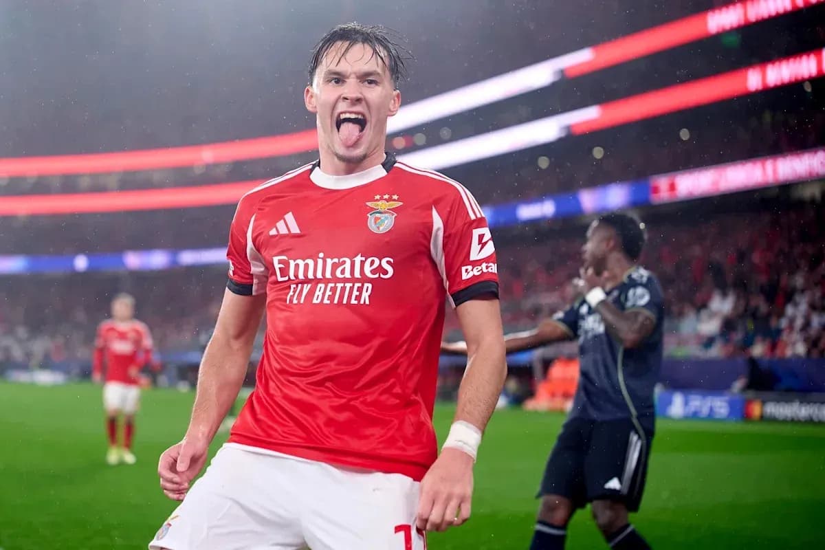 Benfica player celebrating after scoring a goal Benfica player celebrating after scoring a goal
