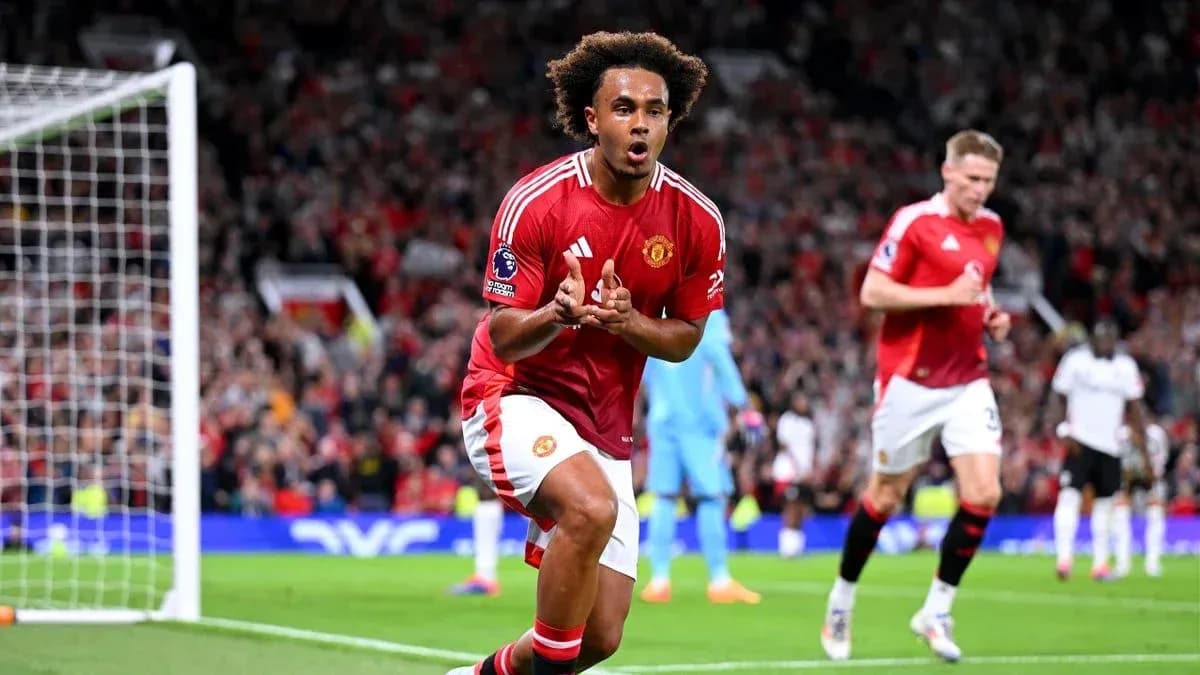 Manchester United player celebrating after scoring a goal Manchester United player celebrating after scoring a goal