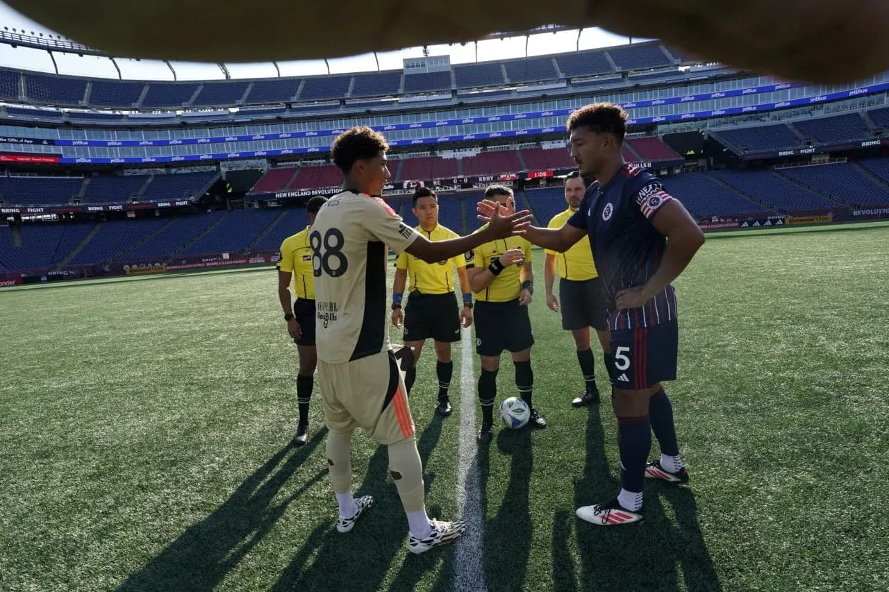Team captains shaking hands before match Team captains shaking hands before match