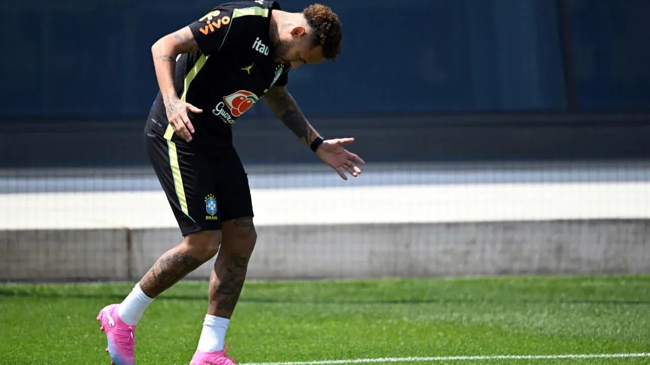 Neymar training on the pitch during practice session Neymar training on the pitch during practice session