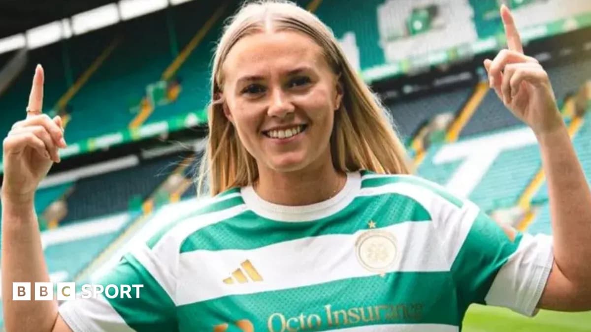 Player celebrating in Celtic jersey at stadium Player celebrating in Celtic jersey at stadium