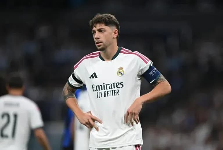 Real Madrid player in white kit during match Real Madrid player in white kit during match