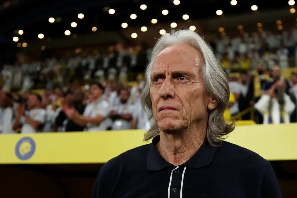 Coach observing the match with focused expression Coach observing the match with focused expression