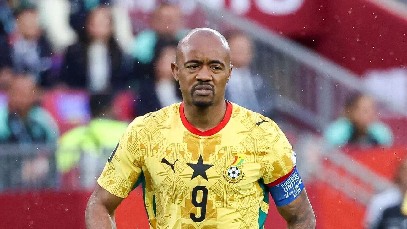 Ghana player in yellow kit during match Ghana player in yellow kit during match