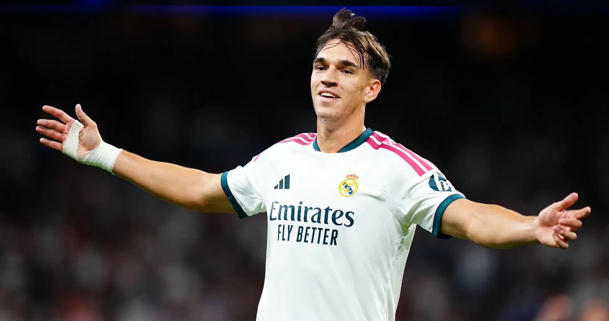 Player celebrating during match in Real Madrid jersey Player celebrating during match in Real Madrid jersey