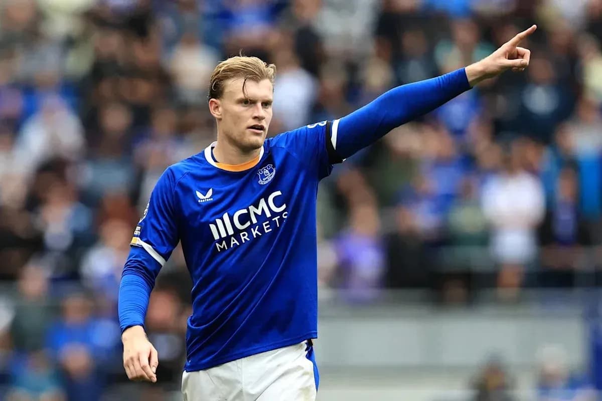 Player gesturing during match in blue jersey Player gesturing during match in blue jersey
