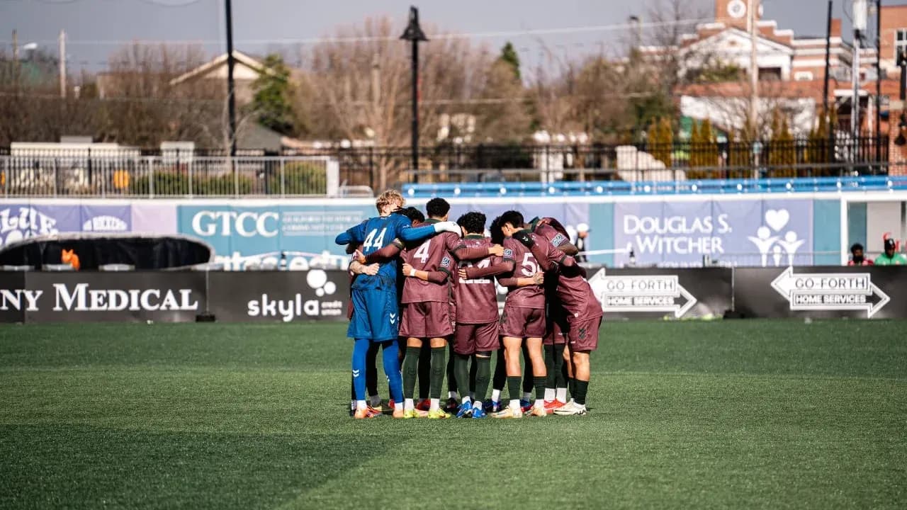 Chattanooga players huddling before match Chattanooga players huddling before match