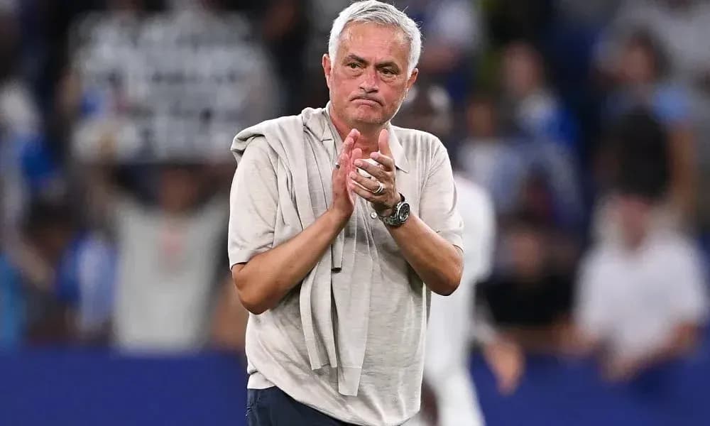 Manager applauding fans after the match Manager applauding fans after the match