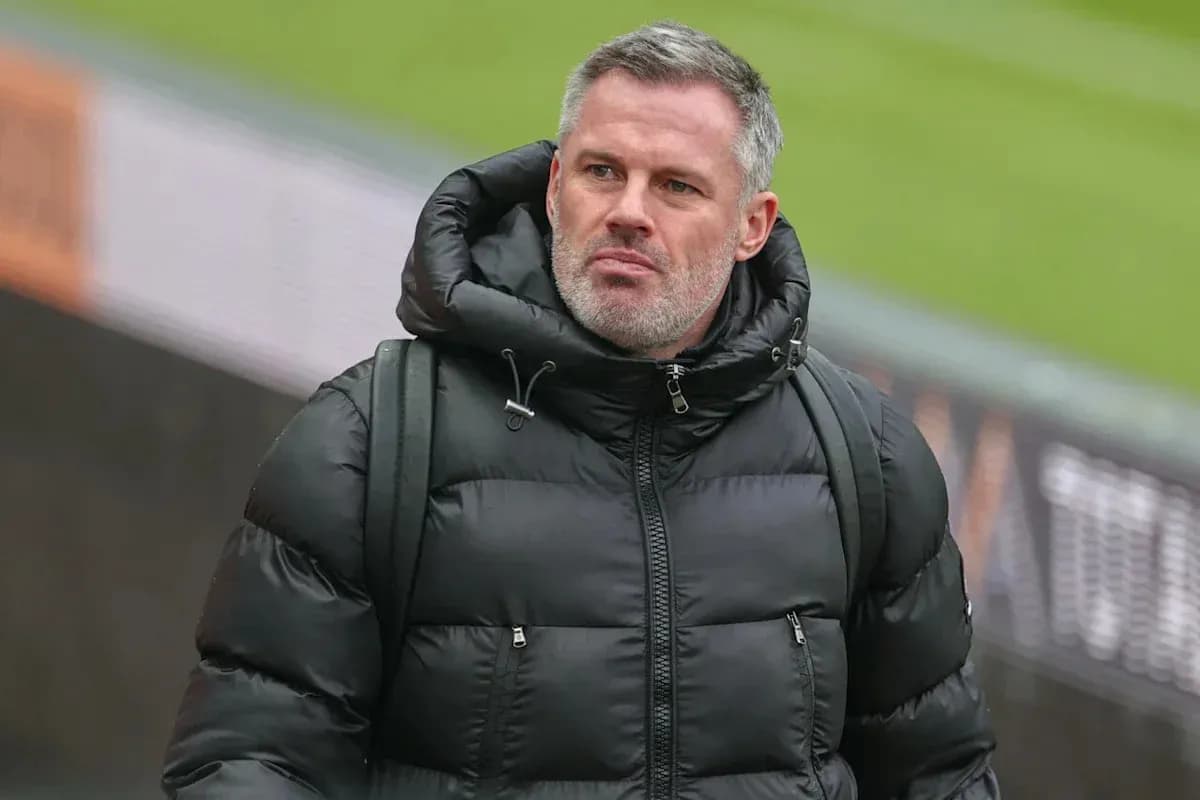 Person wearing a black puffer jacket walking Person wearing a black puffer jacket walking
