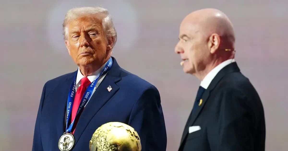 Donald Trump holding FIFA prize with official beside Donald Trump holding FIFA prize with official beside