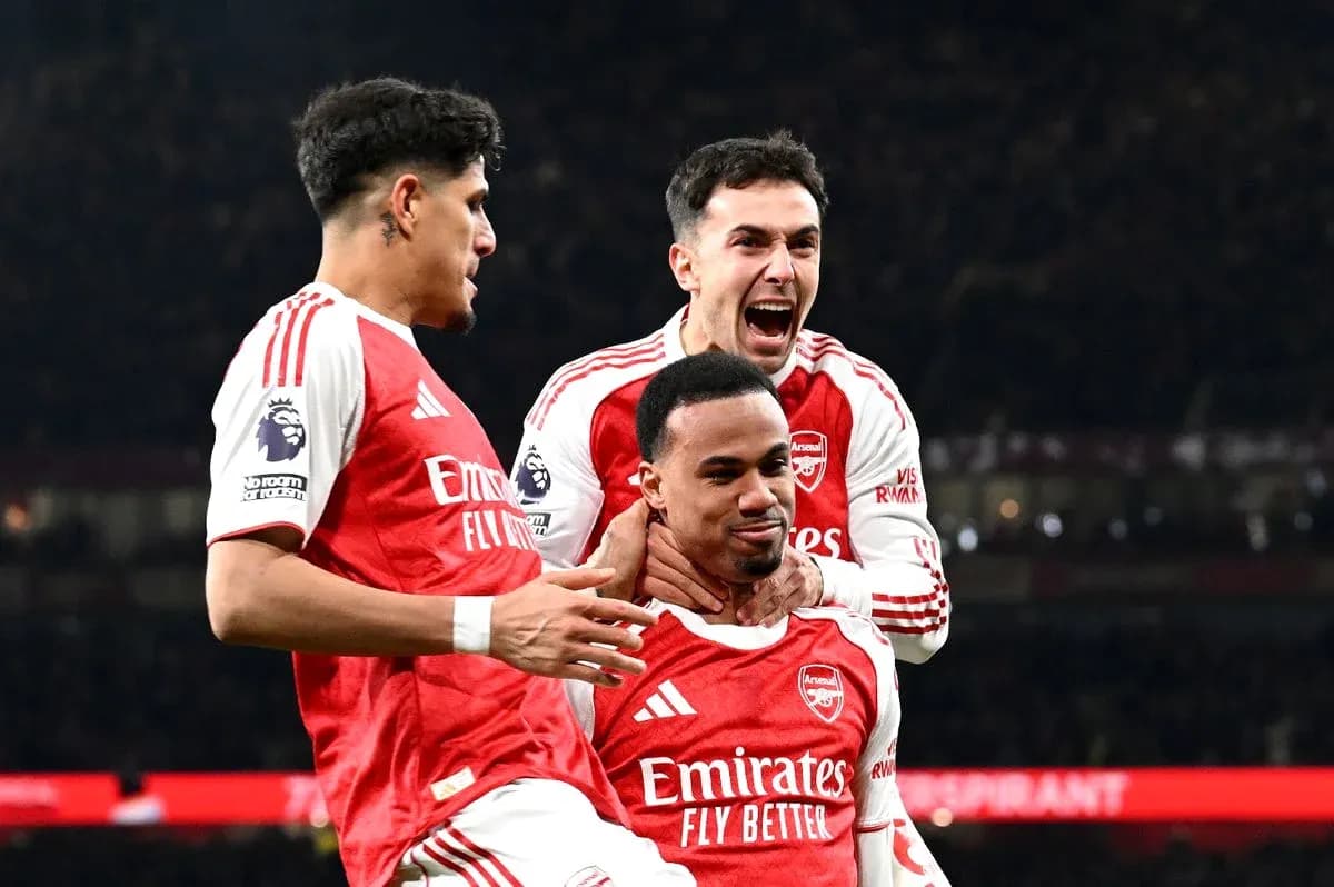 Arsenal players celebrating a goal during match Arsenal players celebrating a goal during match
