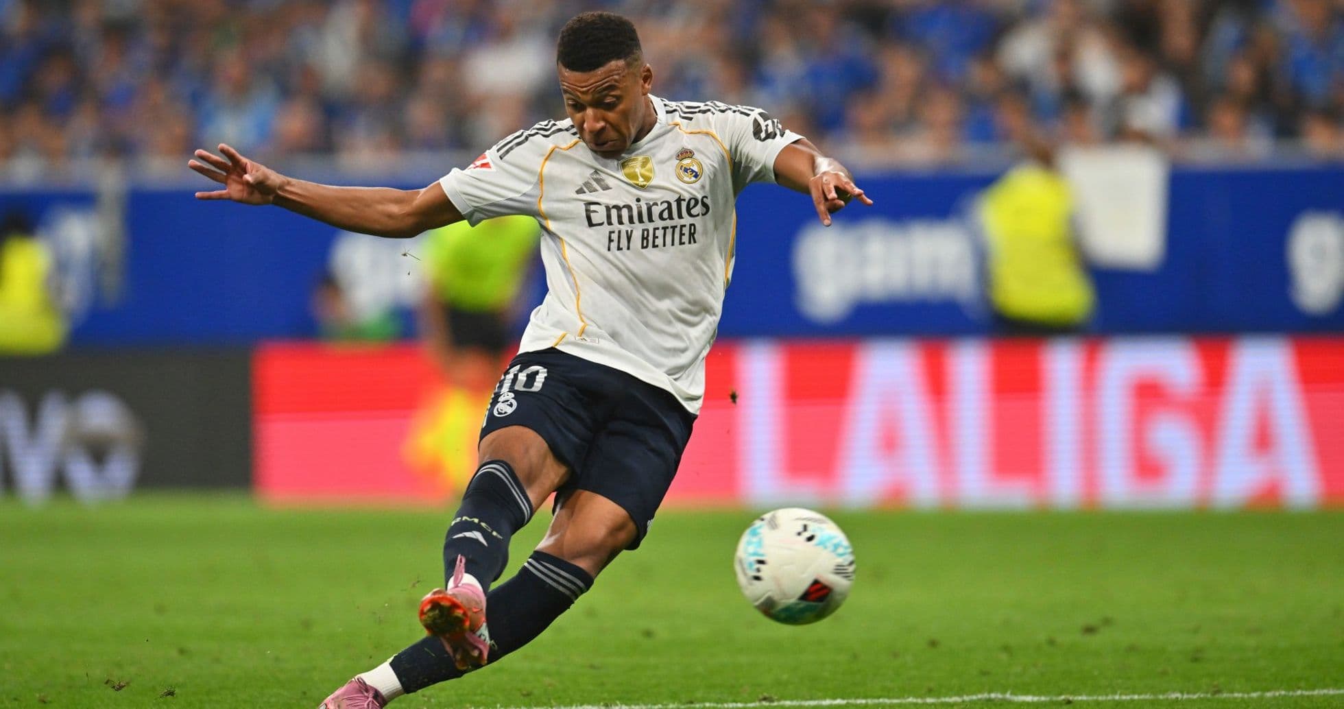 Real Madrid player kicking the ball during match Real Madrid player kicking the ball during match