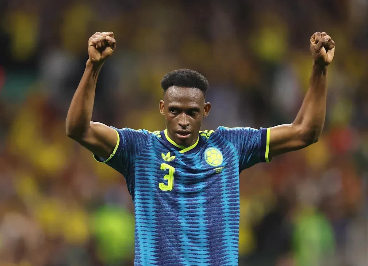 Player celebrating with raised fists during match Player celebrating with raised fists during match