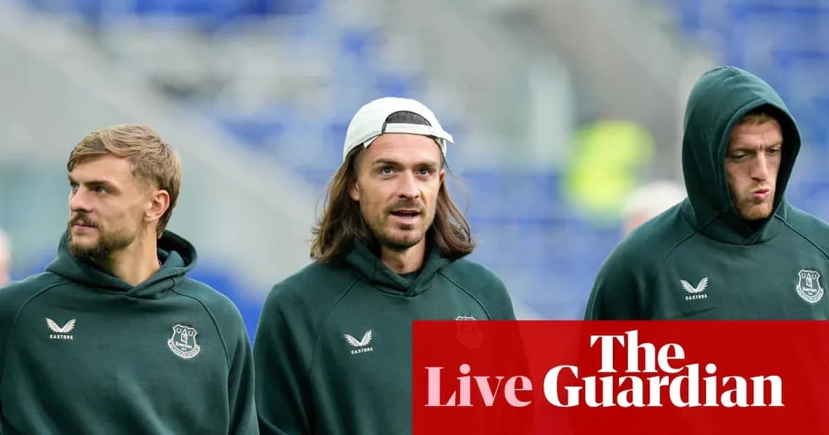Three players in Everton hoodies walking together Three players in Everton hoodies walking together