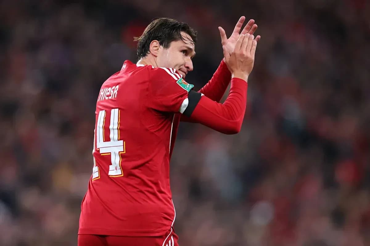 Player applauding fans wearing red team jersey Player applauding fans wearing red team jersey