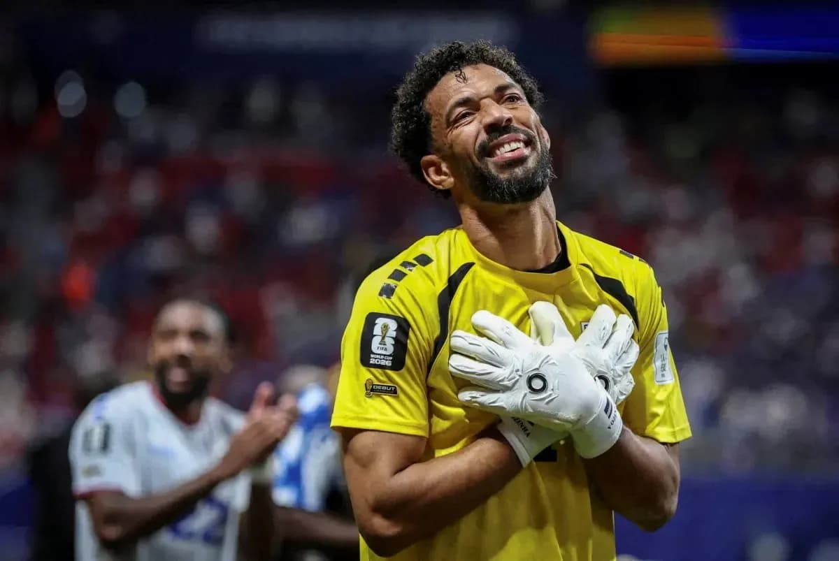 Goalkeeper celebrating after match with teammates Goalkeeper celebrating after match with teammates