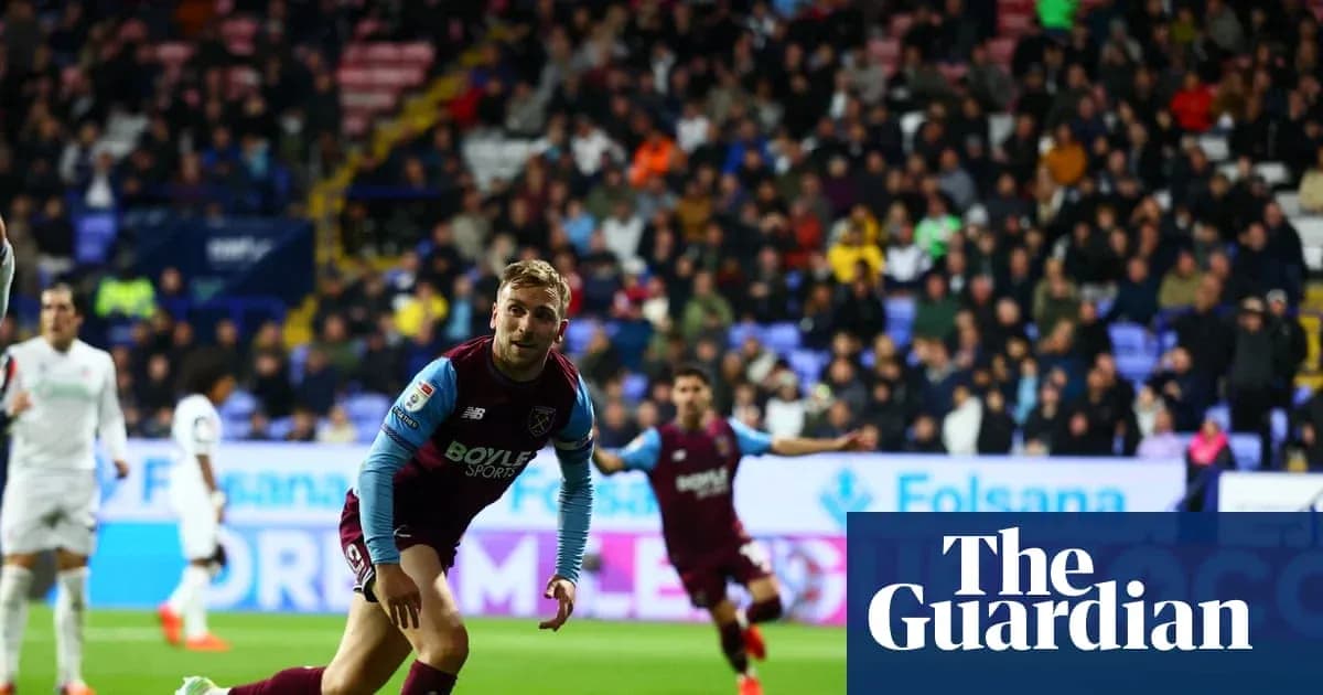 Player celebrating a goal during a match Player celebrating a goal during a match