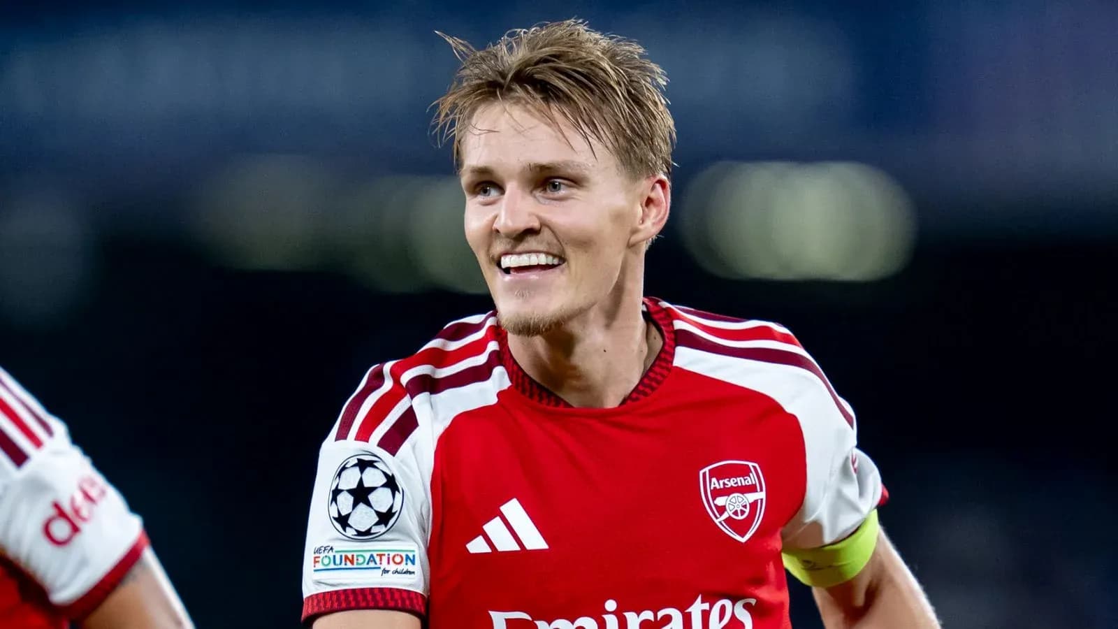 Arsenal player celebrating during a match Arsenal player celebrating during a match