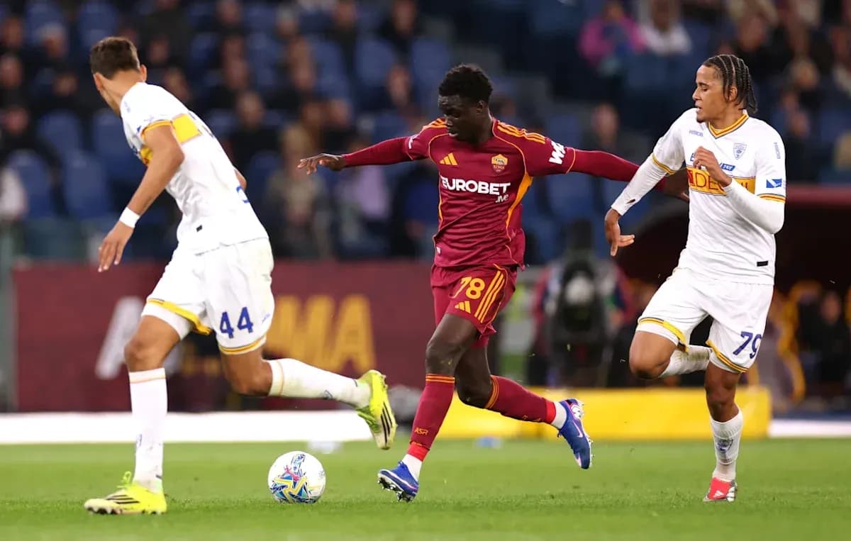Player dribbling past two defenders during match Player dribbling past two defenders during match