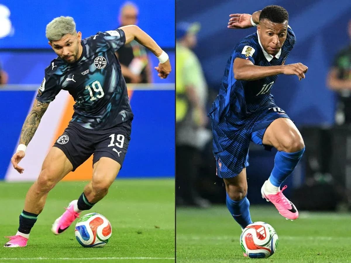 Paraguayan and French players competing for the ball Paraguayan and French players competing for the ball