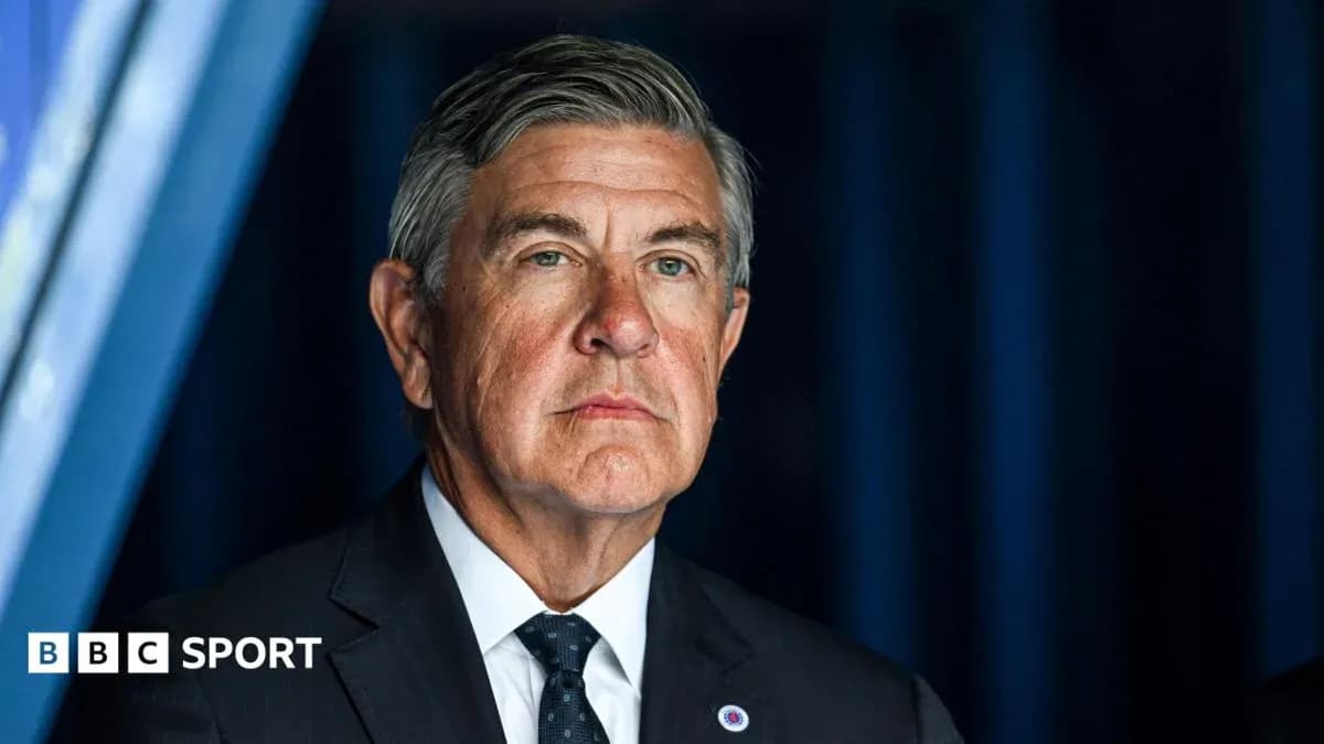 Man in suit looking serious at event Man in suit looking serious at event